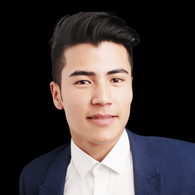 KL Girl Malay Escort Young man in a blue suit and white shirt, smiling. Malaysia Escort Girl Service